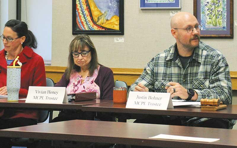Press photo/Shelby Powell - Macon County Public Library Board of Trustees Chair Justin Bohner speaks at the board’s December meeting.