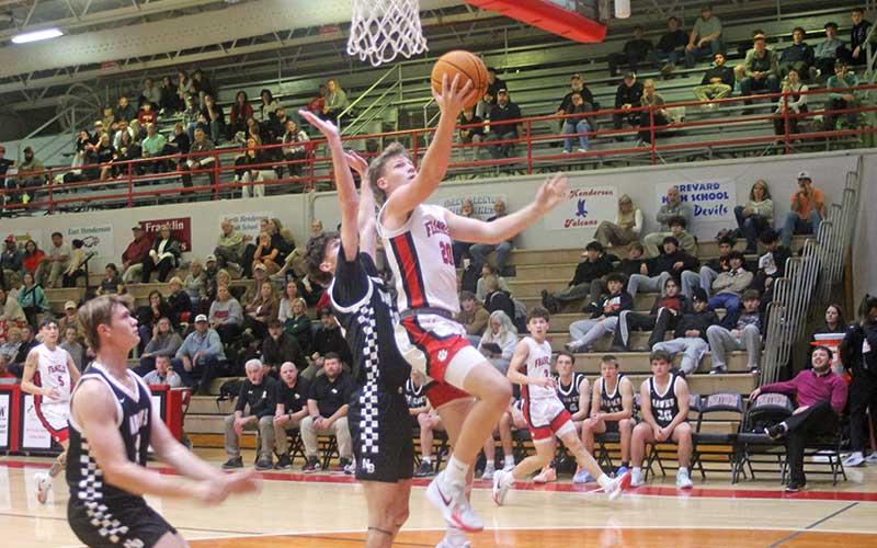 Junior Lance Parker elevates to the rim versus North Buncombe Dec. 2. (Press file photo)