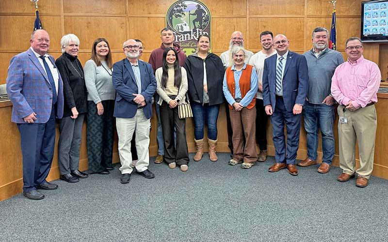Press photo/Mia Overton - Members of the Franklin Town Council, the Noquisi Initiative and the Eastern Band of Cherokee Indians gather following the council’s approval Jan. 5 of a resolution authorizing the transfer of the Noquisiyi Mound to the EBCI.