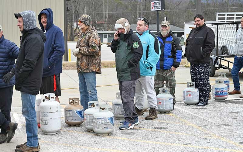 Photo/Bob Scott - Macon County escaped the worst of Winter Storm Fern, but people were preparing for the possibility of icy roads and power outages over the weekend. A line of folks was waiting to fill up propane tanks at Tractor Supply on Saturday.