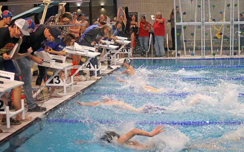 Press photo/Will Woolever - Gavin Alverson wins a photo finish in the boys’ 200-yard medley relay at the Mountain Eight Conference Swimming Championships at the Jackson County Aquatic Center in Cullowhee Jan. 20.