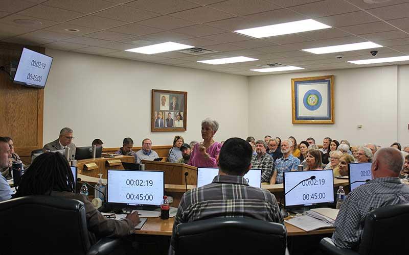 Press photo/Shelby Powell - Lisa Walker speaks about the proposed redistricting at the Feb. 10 Macon County Board of Commissioners meeting.