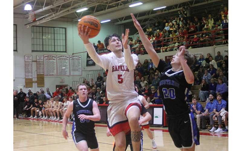 Press photo/Will Woolever - Jack Teesateskie elevates to the rim versus Smoky Mountain Feb. 6.
