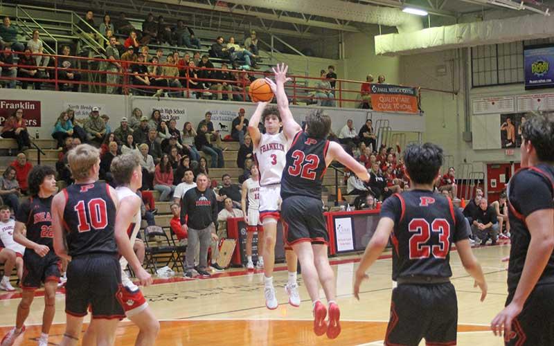 Press photo/Will Woolever - Junior Gunner McConnell attempts a 3-point shot versus Pisgah Jan. 28.