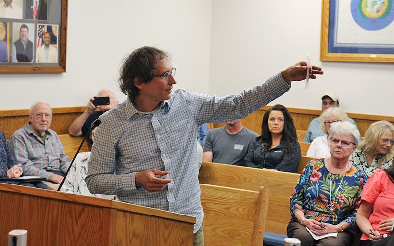 Press photo/Shelby Powell. Jason Love speaks to the Macon County Board of Commissioners at the March 10 meeting.