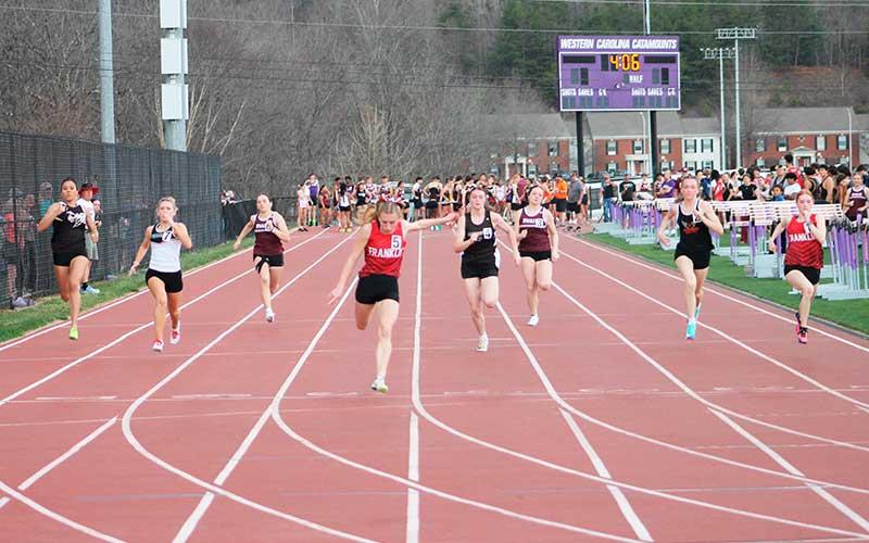 Press file photo - Anna Timan wins the girls 100-meter dash at the Western Carolina Kickoff meet in Cullowhee March 6.