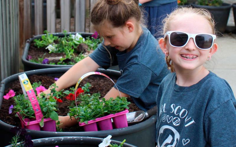 Press photo/Shelby Powell - Girl Scouts Carolina Mersereau and Charlee Hall of Troop 10233. Sadie Hicks (not pictured) also participated in the community service project.