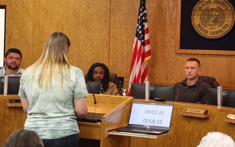 Press photo/Shelby Powell Liz Birolin speaks to the Macon County commissioners to request they choose qualified members for the Macon County Library Board