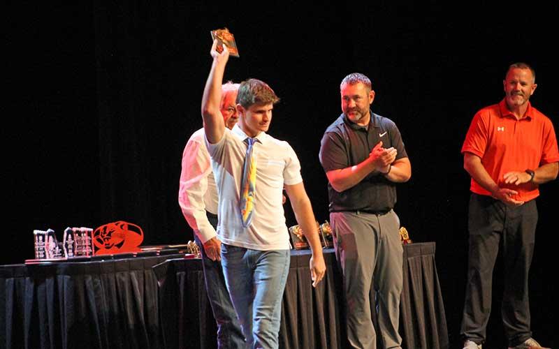 5A 1-meter dive State Champion Jonah Brant shows off his Panther swim and dive Team MVP award. (Press photos/Will Woolever)
