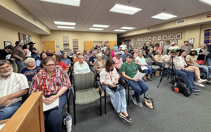 Press photo/Mia Overton - Concerned citizens filled the Franklin Town Hall board room Monday night as the Town Council heard public comment on an ordinance for a 12-month moratorium on data center development.