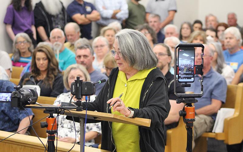 Press photo/Shelby Powell - Margaret Pickett speaks against the Macon County Planning Board's redistricting recommendation, advocating for a five-district system.