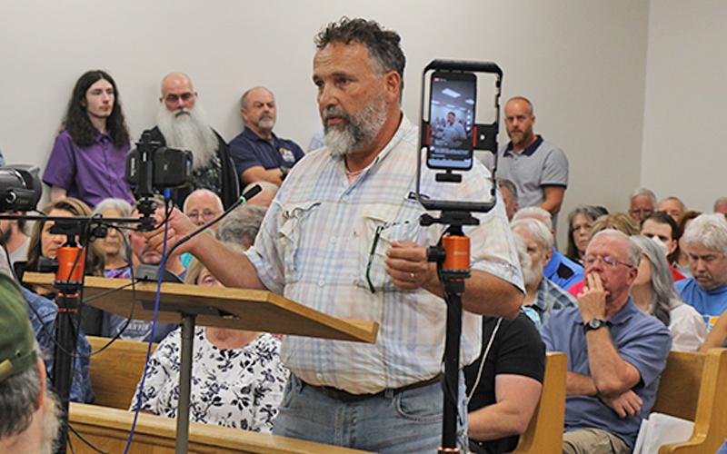 Press photo/Shelby Powell - Chuck Watson speaks out against data centers in Macon County in the Macon County Board of Commissioners' July 14 meeting.