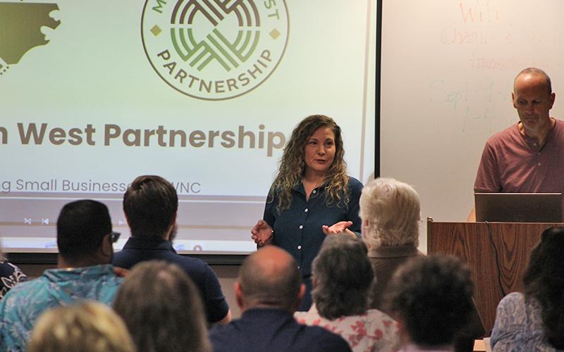 Press photo/Shelby Powell - Elissa Hashemi, director of Mountain West Partnership, speaks at the Eggs and Issues forum on support for small businesses.