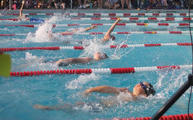 Boys aged 9-10 compete in the 50-yard backstroke for the Franklin Amateur Swim Team June 25. Pictured from foreground are Grayson Jessup, Samuel Hurst and Xzavier Rios. (Press photo/Will Woolever)
