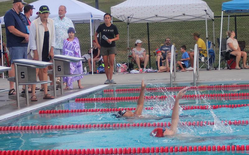 Knox Strum (foreground) and David Hernandez swim a close race in the boys 11-12 100-yard individual medley at the Macon County Rec Park July 2. (Press photo/Will Woolever)