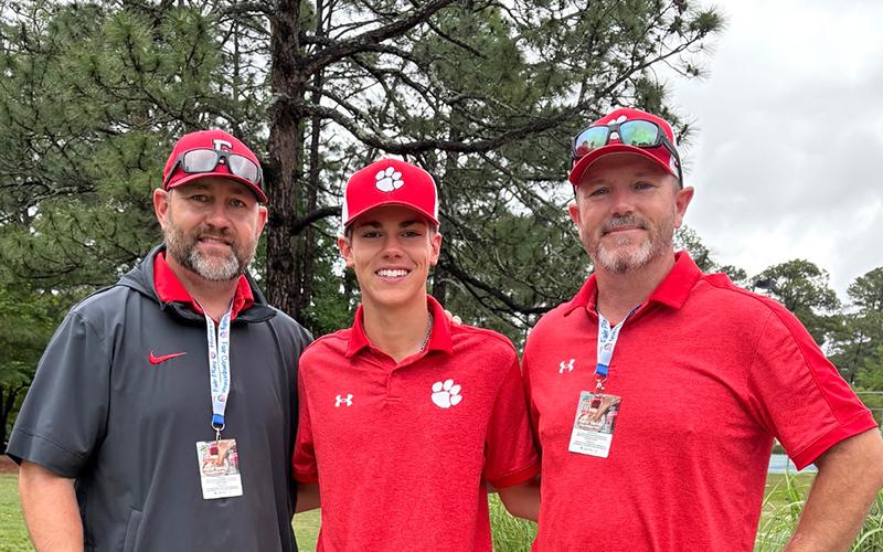 Ryan Raby (right), Franklin High School's longtime men's golf head coach and new athletic director, is pictured with former golf standout Tanner Jones (center) and departing A.D. Matt Bradley at last year's 3A State Championship. (Press file photo)