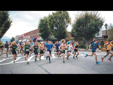 Stephan Pruitt Photography - The Naturalist starts in downtown Franklin and it’s 3 1/2 miles until runners reach the Bartram Trail at Wallace Branch. A record number of runners participated Saturday in the 25K and 50K races.