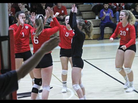 Press photos/Andy Scheidler - With the official’s arm signaling the last point, players on Franklin’s volleyball team celebrate winning the first set Saturday against Draughn. From left: Maitlyn Rewis, Alison Knop, Adrianne Duvall, Rhiley Bryson, Taylor Carlton.