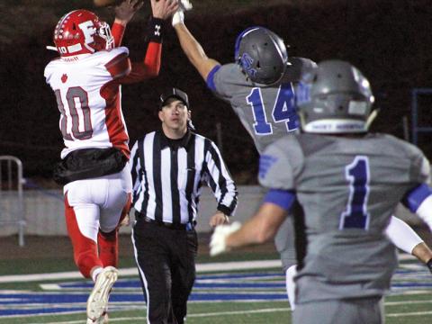 Press photo/Andy Scheidler - Franklin sophomore Devyn Blackburn tries to make a leaping grab but Smoky’s Dustin Stephens deflects the pass. 