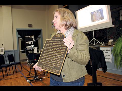 Press photo/Jake Browning - Marty Greeble presents the next plaque for the Women’s History Trail, which will commemorate the life of Rebecca Na’Ha Morris.