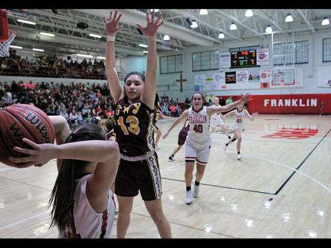Press photo/Andy Scheidler - Franklin junior Nevaeh Tran prepares to make an inbounds pass, looking for Makayla Brewer (40) and Sierra Wade (23) while being defended by Cherokee’s Deante Toineeta during action Friday, Jan. 3. 