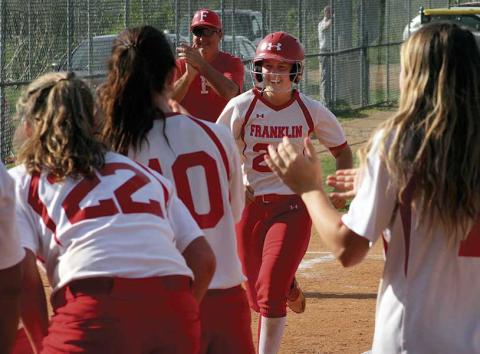 Press file photo - With teammates waiting at the plate, Taylor Carlton finishes a home run trot last season. She’ll play next year at Catawba Valley CC. 