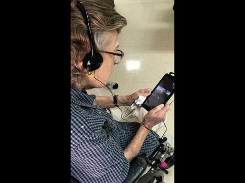 Photo submitted - Ann Clark, a resident of Macon Valley Nursing and Rehabilitation Center, uses her new tablet to Skype with her family.