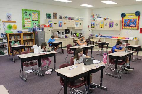 Press photo/Jake Browning - Students in Cynthia Trawick’s fourth-grade class at Cartoogechaye Elementary School practice social distancing.
