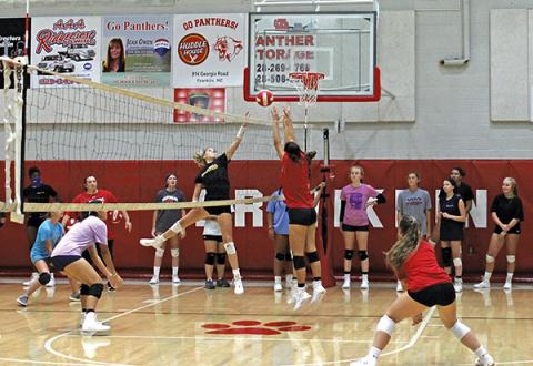 Press photo/Will Woolever - Members of the Franklin High School volleyball team work out at the school gym. Official practice begins Nov. 4. 
