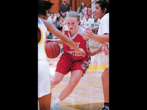 File photo - Two-time All-Western North Carolina senior Canaan Drake drives toward the lane durng a game last season. The Panthers will defend their Mountain Six Conference title against tough competition after the new year.
