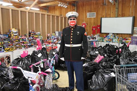 Press photo/Will Woolever - Smoky Mountain Toys for Tots regional coordinator Randy Hughes is pictured in the group’s current storage space ahead of the Christmas holiday. Toys for Tots is currently seeking a new space for the new year.