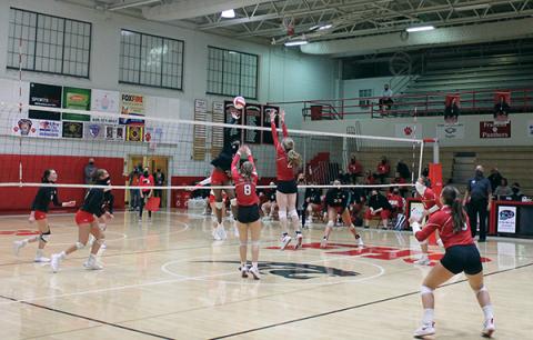 Photo submitted - Middle blocker Anya Valentine sends a spike over the net in a game against Hendersonville Now. 16. Valentine was dominant 