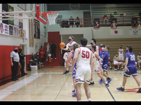 Press photo/Will Woolever - Junior guard Keagan Pollock attempts a layup in the Panther Den against Smoky Mountain Jan. 27. Franklin’s boys team got its first two wins to move to 2-3 on the season.