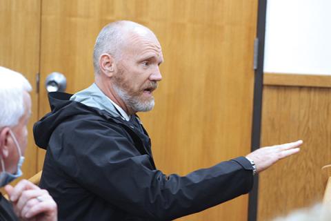 Press photo/Jake Browning - Macon County Schools superintendent Chris Baldwin addresses the county commissioners at a special called meeting on Feb. 26.