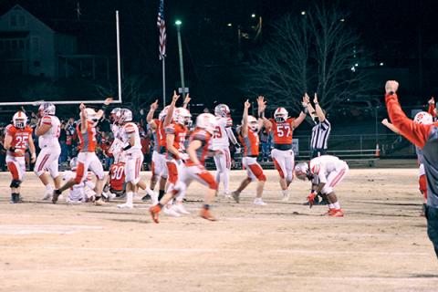 Press Photo/Will Woolever Panther players celebrate after making the final tackle to cement their stunning win over Hendersonville. 