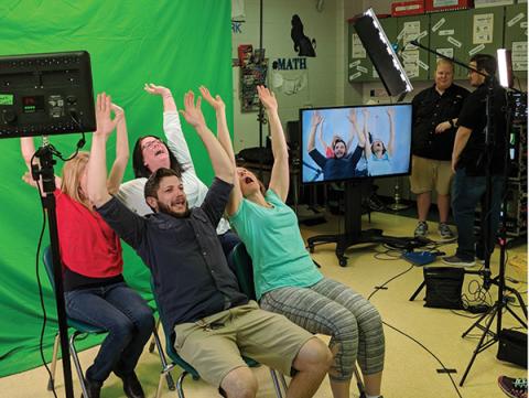 Photo submitted - Backlot Cinema teamed up with the Macon County Schools STEM program for a unit on video technology and production careers, demonstrated here with the use of a green screen. 