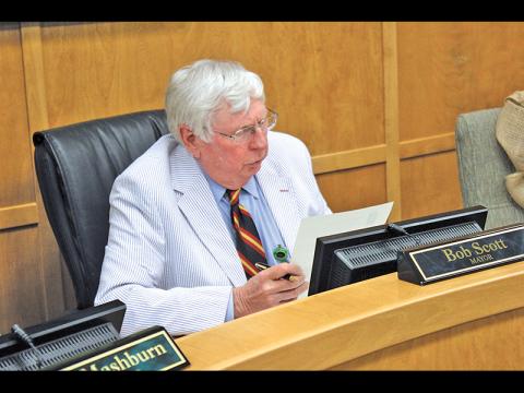 Press photo/ Jake Browning - Franklin Mayor Bob Scott reads a proclamation honoring former town council member and vice-mayor Barbara McRae. 