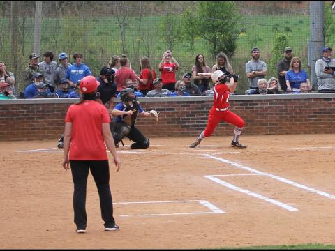 Press Photo/Will Woolever - Sophomore third baseman Tori Ensley knocks a 2-run homer against Smoky Mountain April 13. Ensley has compiled a .483 batting average on the season with 14 hits and 10 RBI’s. 