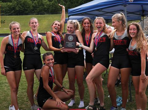 Photo courtesy of FHS track and field - Members of the FHS women’s track and field team show off their hardware after taking 2nd place at the 2A West Regional meet June 18.