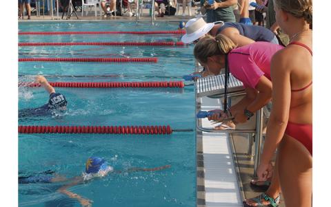Press Photo/Will Woolever - F.A.S.T. timers watch a last-second finish between two swimmers in the boys’ 9-10 50-yard freestyle.