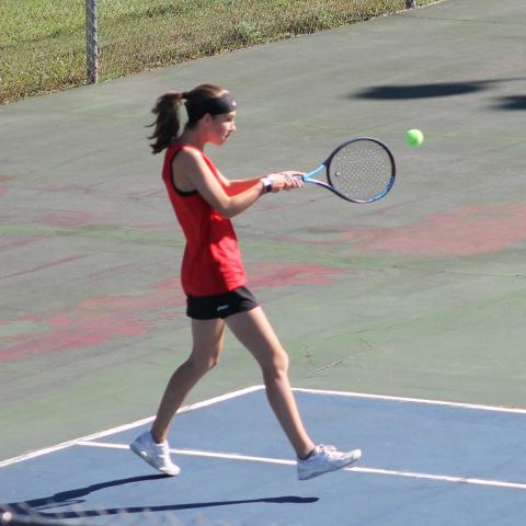 Press Photo/Will Woolever - Freshman Maci Stork attempts a backhand against West Henderson Oct. 9.