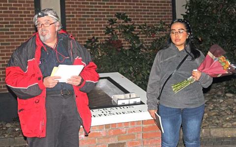 Press photo/Jake Browning - John deVille and Claudia Aguilar speak at the march in memory of Mitchell Mozeley, who was lynched by a mob in 1898.