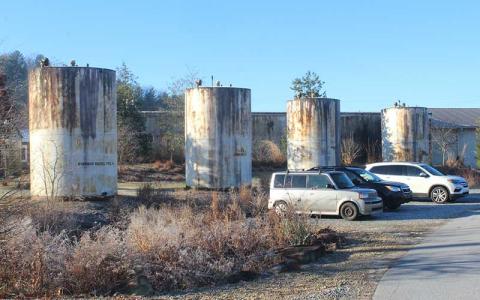 Press photo/Jake Browning - Mainspring is working with artist Scott Allred on a plan to paint murals on the old Duncan Oil tanks.