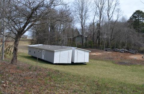 Press photo/Mia Overton - The Franklin Board of Adjustment denied a variance for this mobile home in the Alpine Cottages neighborhood off Bellview Road. The community’s restricted covenants were amended to allow the mobile home, but that conflicts with the town’s zoning regulations for that area. 