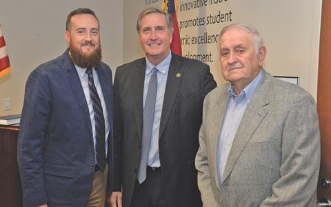 Photo submitted Jerry Sutton (right) served on the SCC Board of Trustees from 1983 to 2015. He participated in the swearing-in ceremony for his grandson Cory McCall (left) in 2019. They are pictured with SCC President Don Tomas.