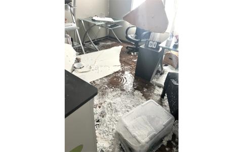 Photo submitted A pipe in the REACH shelter’s sprinkler system burst causing the ceiling to collapse and flood the entire shelter. The computer lab (pictured) and adjoining rooms sustained ceiling and wall damage.