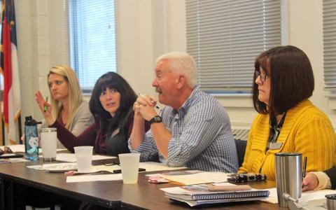 Press photo/Thomas Sherrill - Macon County Board of Education members attend a budget workshop on March 14. Pictured (from left) are Diedre Breeden, Hilary Wilkes, Chair Jim Breedlove and Vice Chair Melissa Evans.