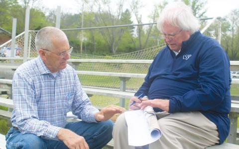 Press photo/Thomas Sherrill Macon County Board of Commissioners Chair Paul Higdon and LS3P Architect Paul Boney speak about Phase One of the Franklin High School project during a site vision on Thursday, April 13. 