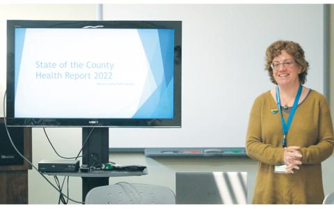 Press photo/Thomas Sherrill Jen Germain of the Macon County Health Department gives a presentation to the Board of Health regarding the State of the County Health Report during the board’s March 28 meeting. 