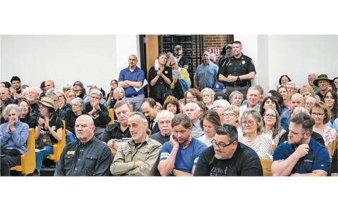 Photo/Bob Scott It was a standing-room only crowd at the April 11 Board of Commissioners meeting. Most attendees were there to speak about the library. Due to the size of the crowd the meeting had to be moved from the commissioners’ board room to the courtroom on the fourth floor of the courthouse.